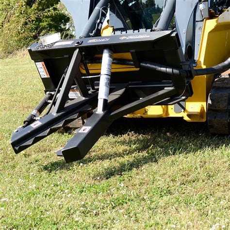 post puller skid steer|best tree puller for tractor.